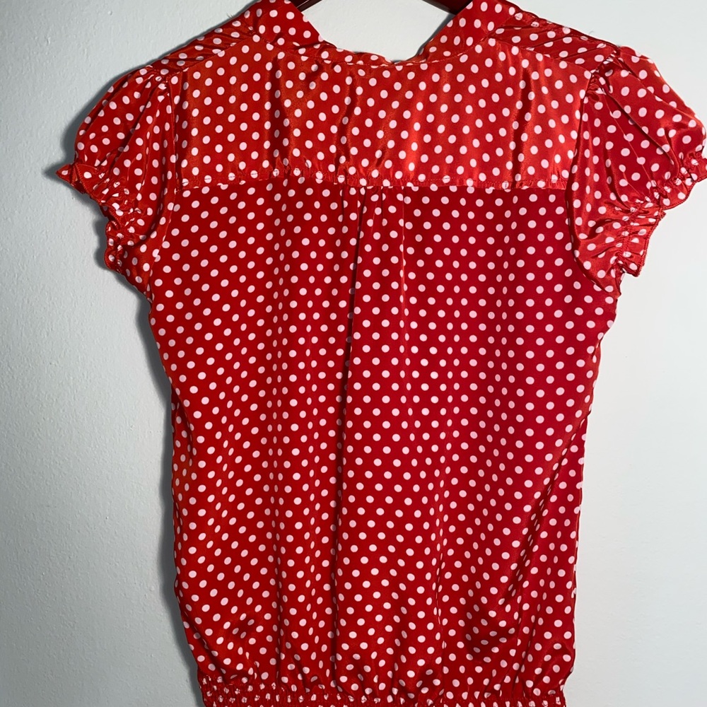 orange/red white polka dot blouse